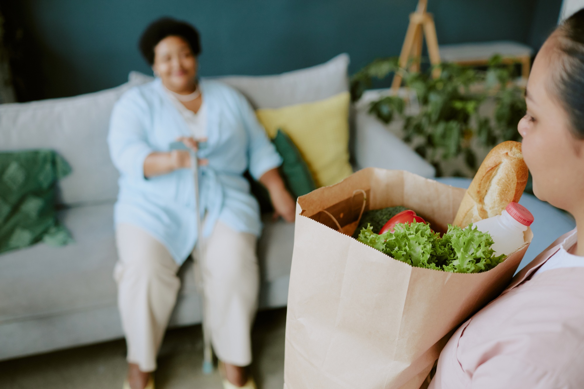Giving Care Package to Senior Patient